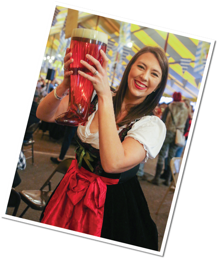 Woman holding Das Boot beer stein